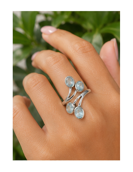 Bague réglable en argent et en aigue marine facettée